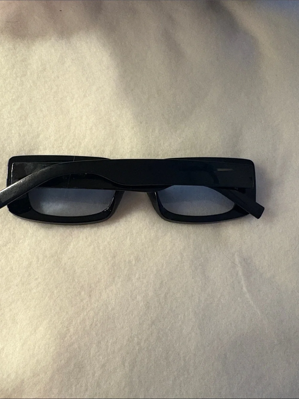 Rectangular Black Retro Sunglasses with light Baby blue lens.